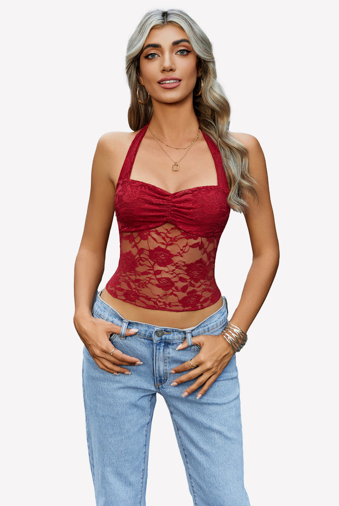 Burgundy lace Y2K halter top with ruched neck, paired with jeans. Fashionable and comfortable.