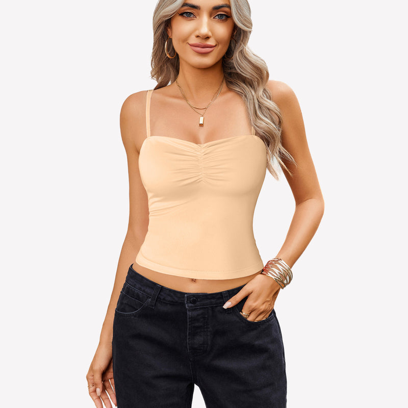 Beige ruched camisole crop top with adjustable straps and black jeans, a cute outfit.