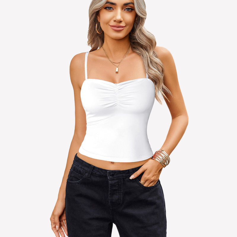 White ruched camisole crop top with adjustable straps and black jeans, a cute outfit for women.