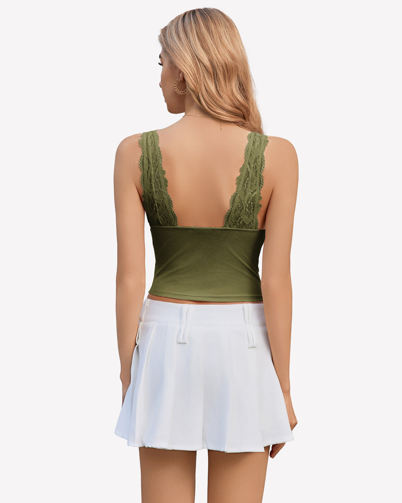 Green lace Y2k tank top with wide straps and white pleated skirt, perfect for going out.