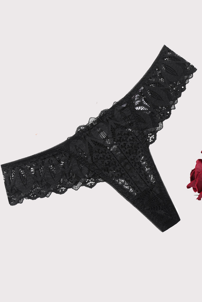 Black lace thong underwear with low waist and cross back design. Sexy and elegant lingerie.