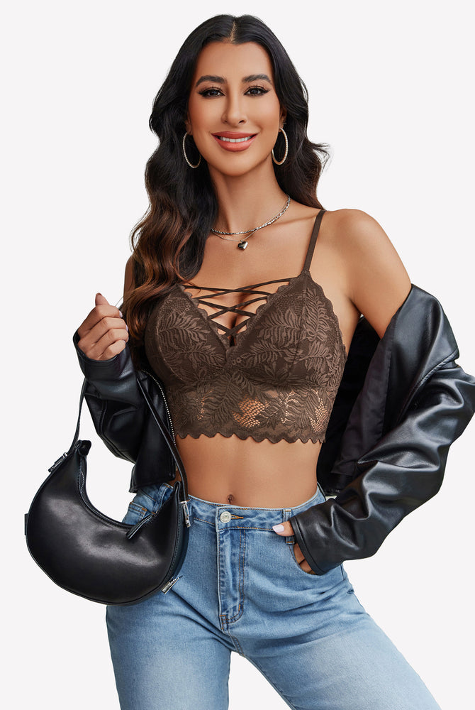 Brown lace Y2K camisole tank top with criss-cross straps and light-wash jeans. Sexy lingerie.