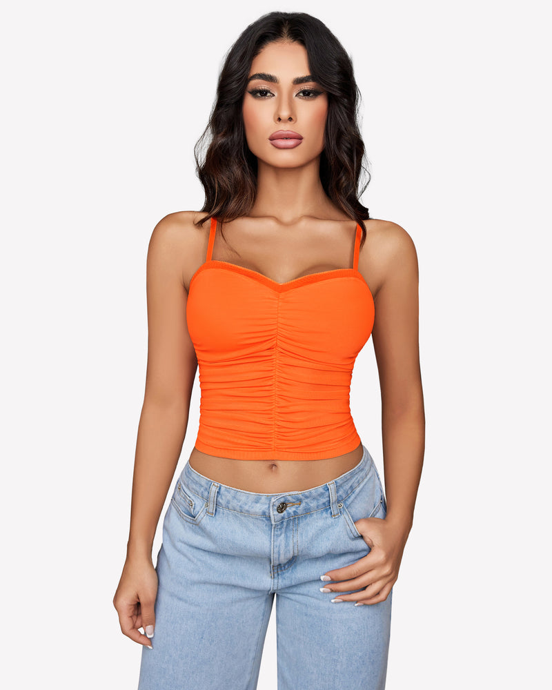 Orange ruched mesh crop top with spaghetti straps, Y2K style, paired with light blue jeans, Avidlove