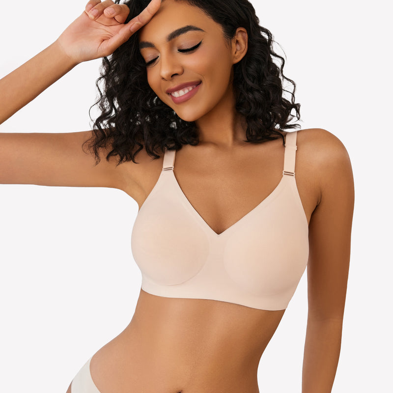 Beige wireless push-up bra, V-neck, full coverage, seamless smoothing, model smiling