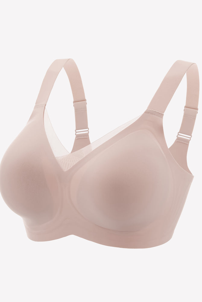 Seamless comfort bra in light pink, no underwire, adjustable straps, perfect for all-day comfort