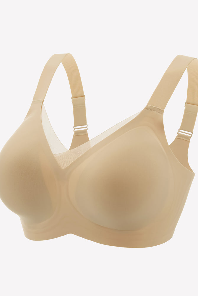 Beige seamless comfort bra with adjustable straps and no underwire, perfect for all-day comfort