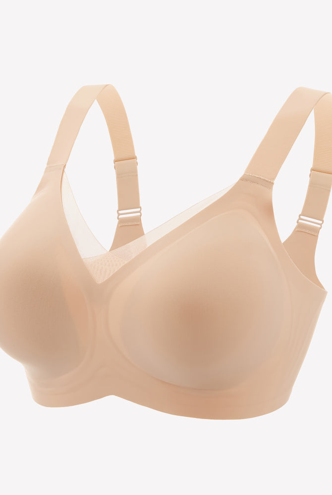 Seamless beige comfort bra with adjustable straps and wire-free design for all-day comfort