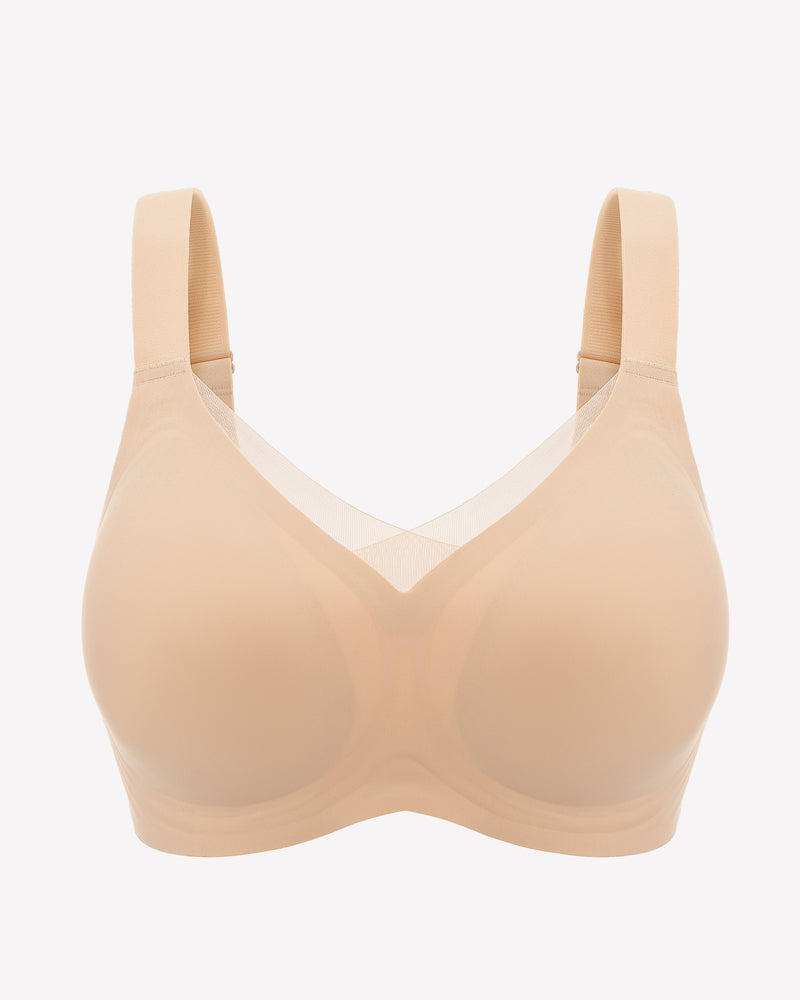 Beige seamless comfort bra with adjustable straps and wire-free design for all-day comfort