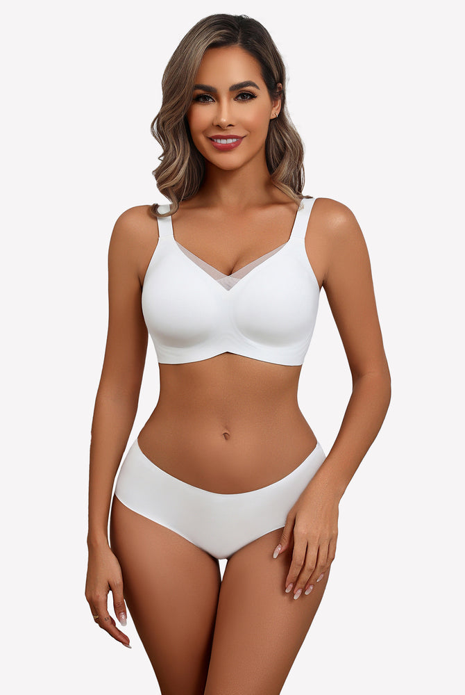 White seamless comfort bra, no underwire, adjustable straps, all-day comfort, modeled by a woman