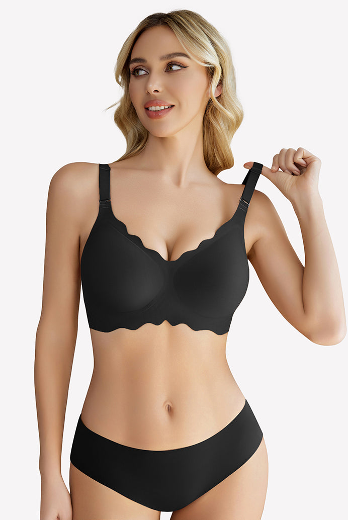 Black wireless full coverage push up bra with scalloped edge, model wearing matching underwear