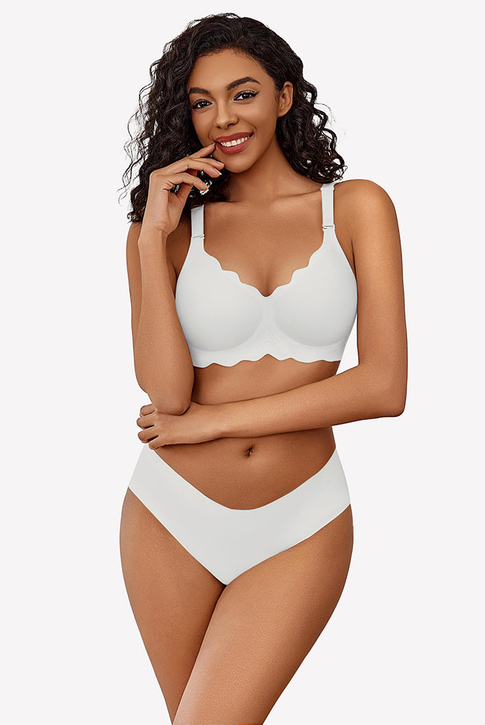 White wireless full coverage push-up bra and underwear set with scalloped edges, smiling model