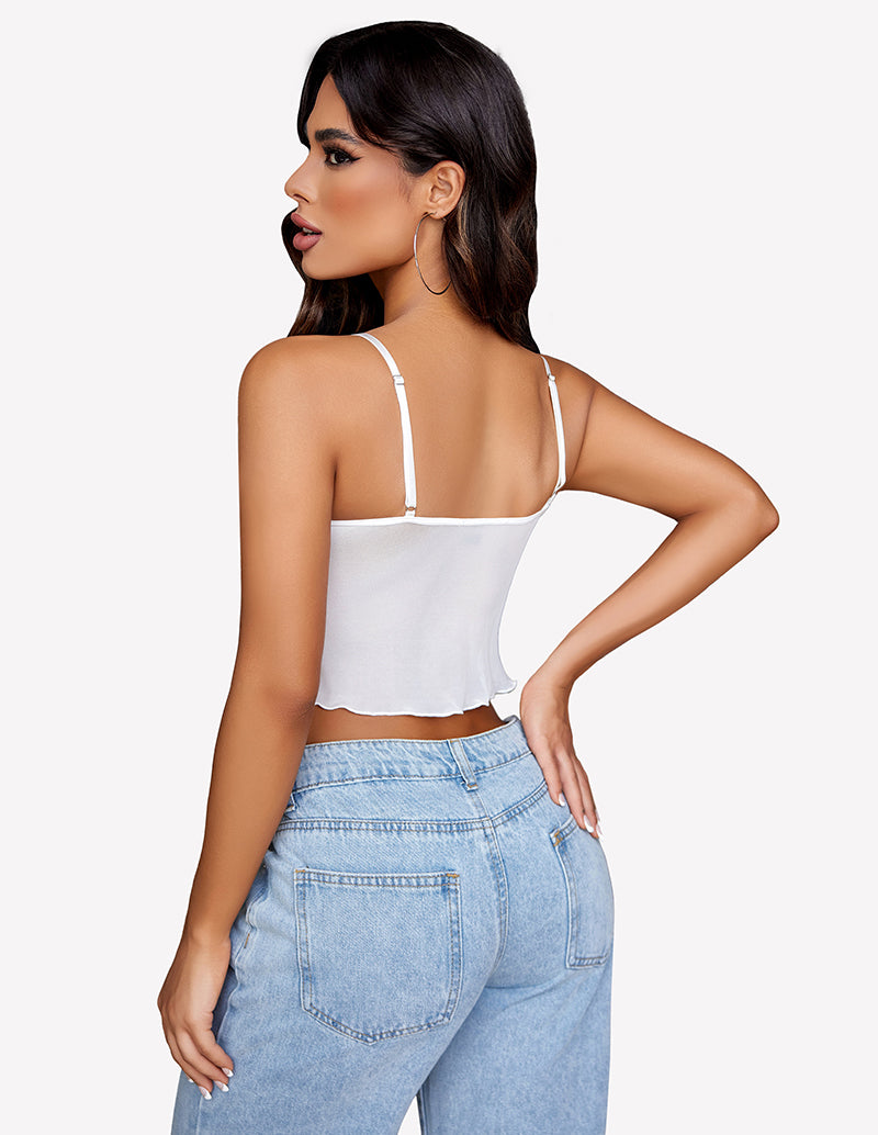 White mesh Y2K crop top with adjustable straps, paired with jeans. Trendy summer tank top.