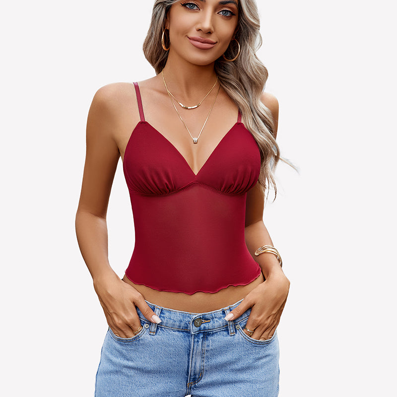 Burgundy mesh crop top with adjustable straps and jeans. Y2K summer fashion.