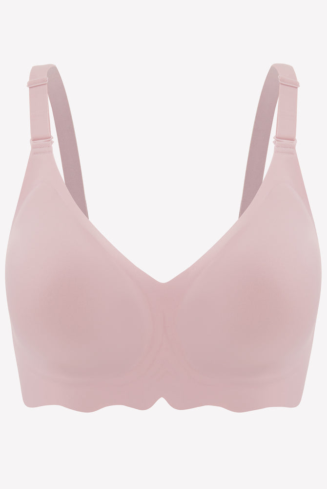 Light pink wireless bralette bra with V-neck and petal edge design, comfortable and stylish.