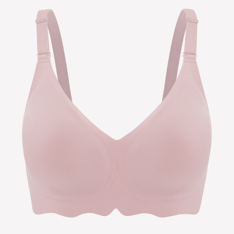 Light pink wireless bralette bra with V-neck and petal edge design, comfortable and stylish.
