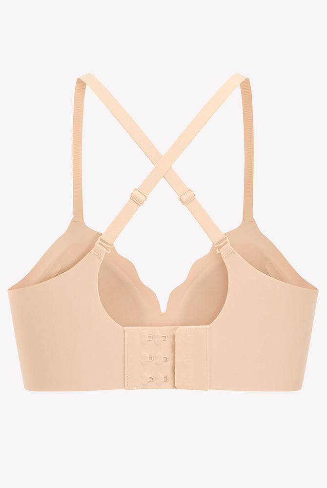 Beige seamless push-up wireless bra with scalloped V-neck, comfortable and supportive