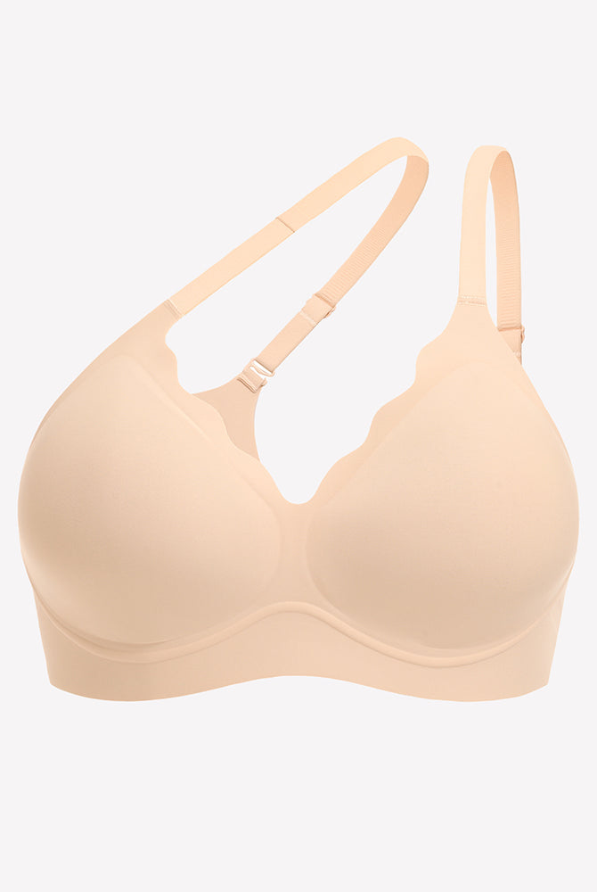 Beige wireless push-up bra with scalloped V-neck, adjustable straps, and full coverage