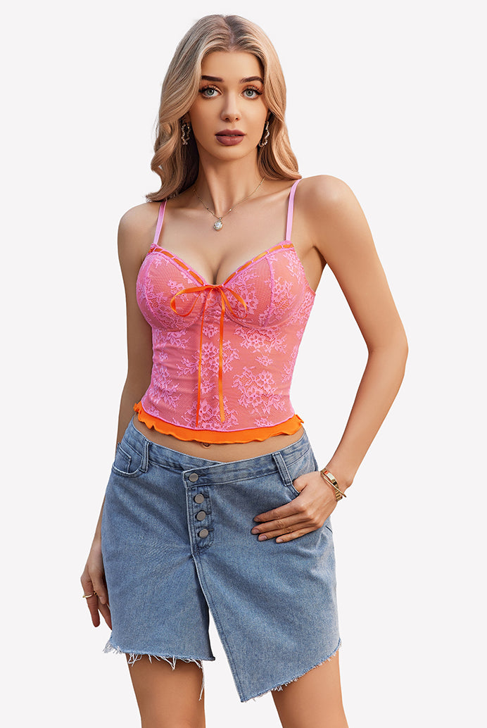 Pink Y2k lace tank top with bow detail and spaghetti straps, denim skirt. Y2k going out style.