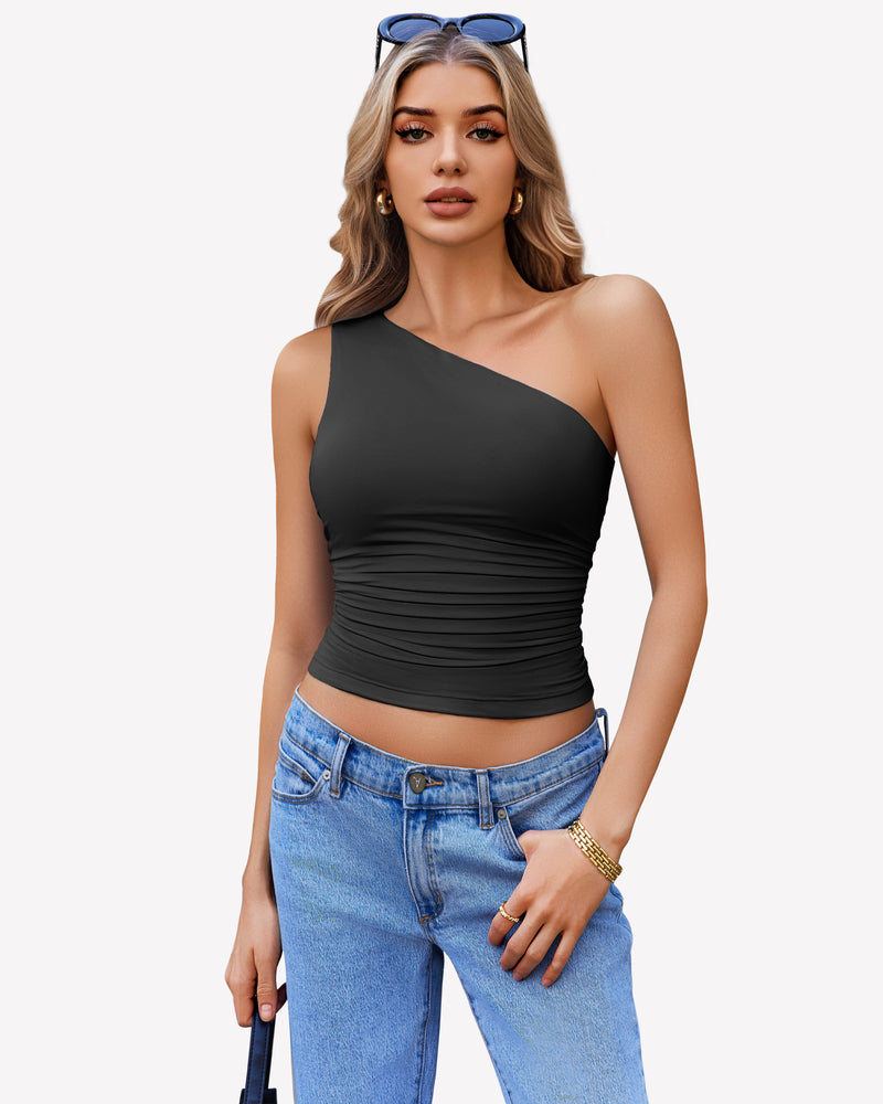 Black one-shoulder tank top paired with blue jeans, a stylish and casual look