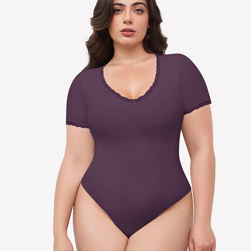 Mauve short sleeve V-neck bodysuit with lace trim, light smoothing effect and flattering fit.