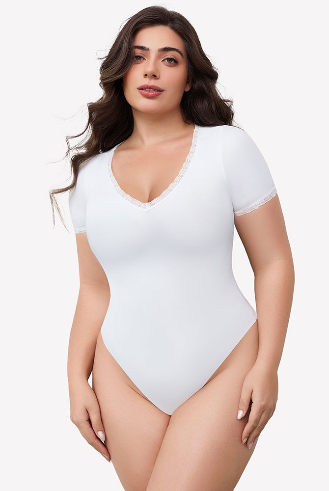 White V-neck bodysuit with lace trim, short sleeve, light smoothing effect and flattering fit.