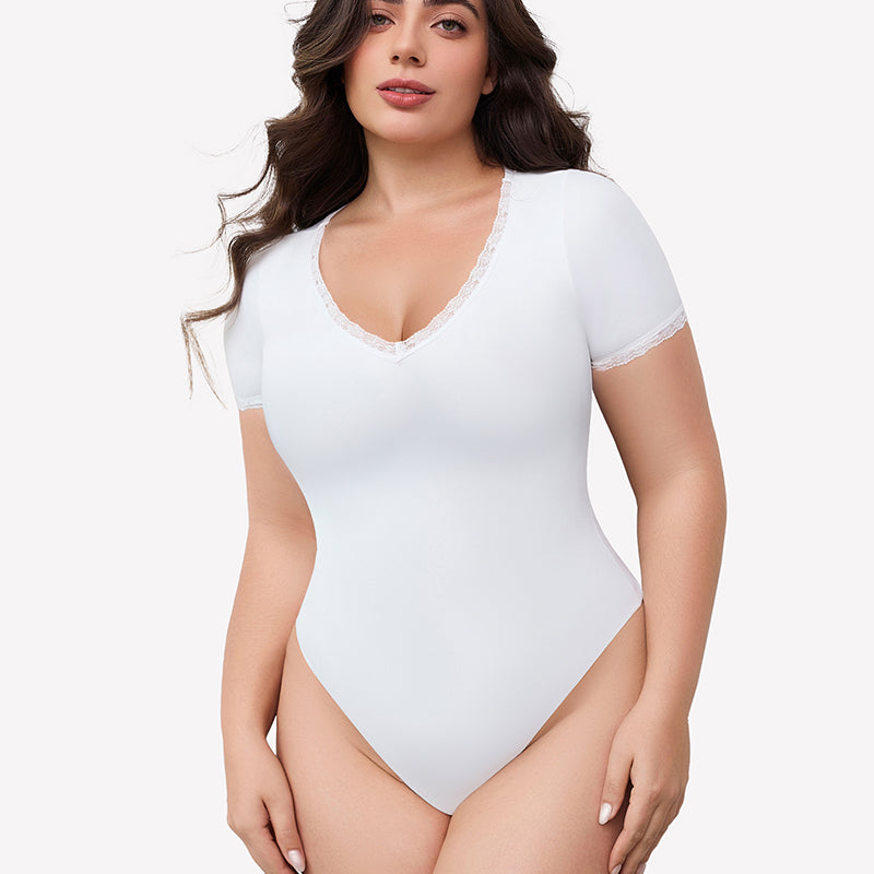 White V-neck bodysuit with lace trim, short sleeve, light smoothing effect and flattering fit.