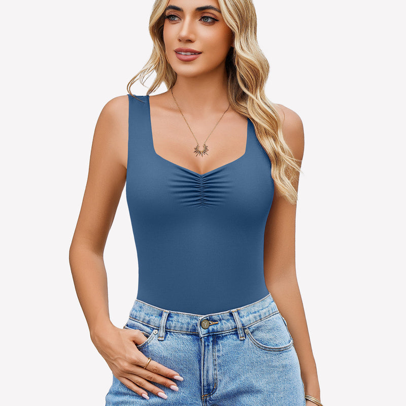 Blue sweetheart neck ruched bodysuit tank top with blue jeans. Casual wear.