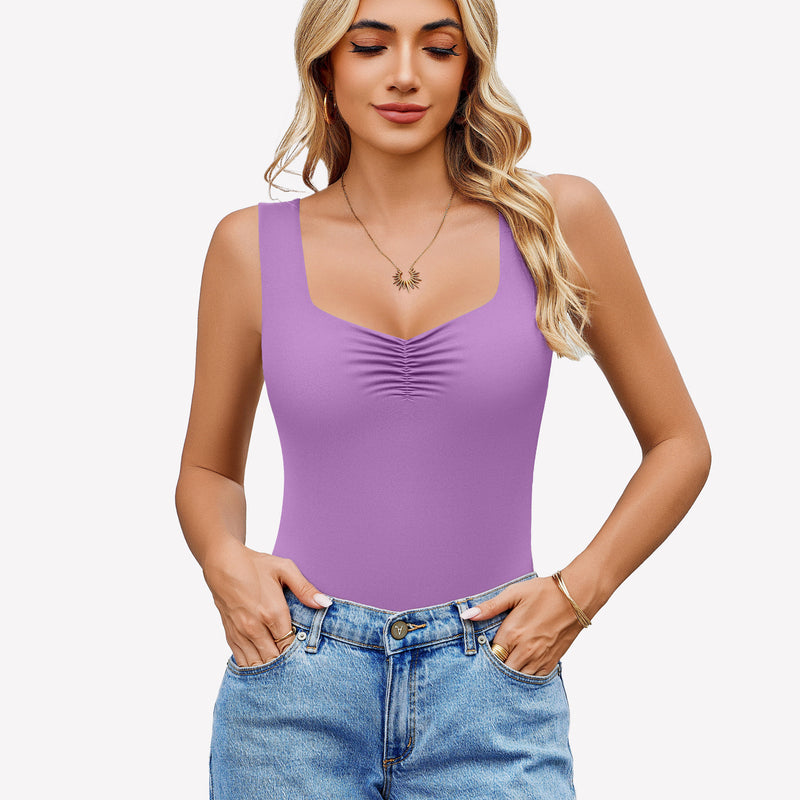 Lilac sweetheart neck ruched bodysuit tank top with blue jeans. Casual wear.