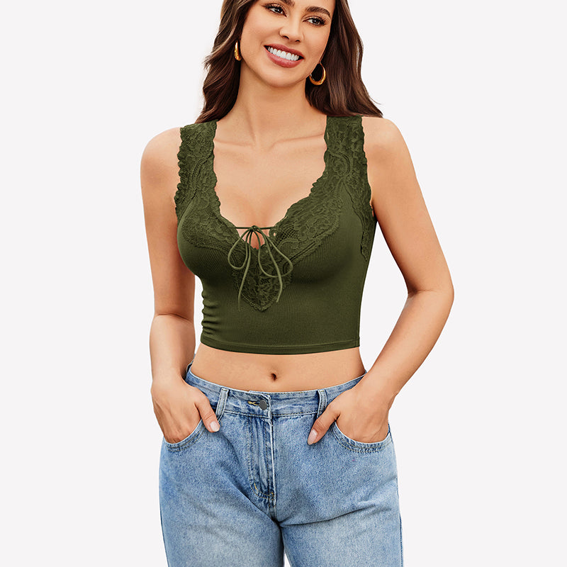 Green V-neck crop top with lace trim and tie-up front, paired with jeans. Sexy and charming style.