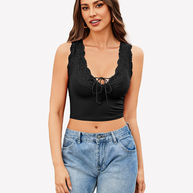 Black V-neck crop top with lace trim and tie-up front, paired with jeans. Sexy and charming style.