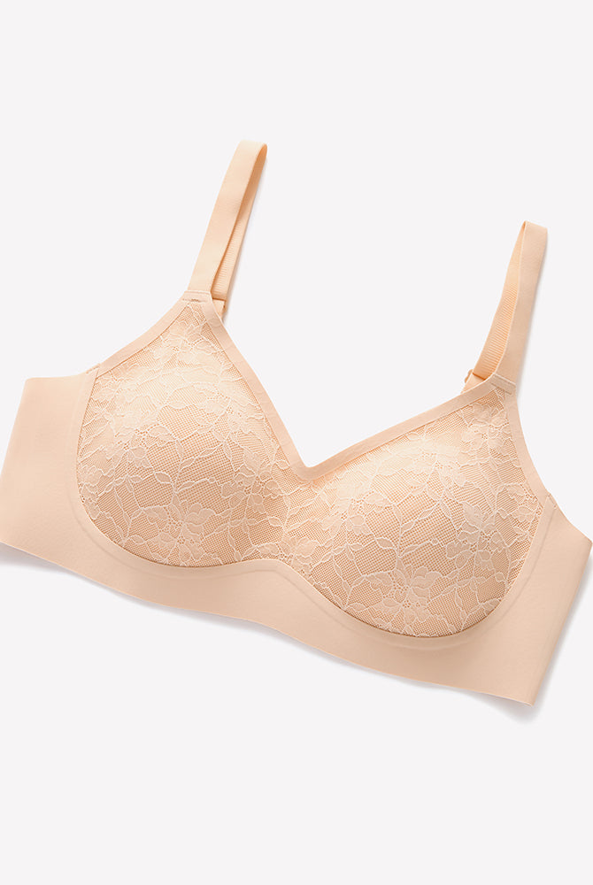 Beige lace V-neck wireless bra with adjustable straps, offering comfort and support.