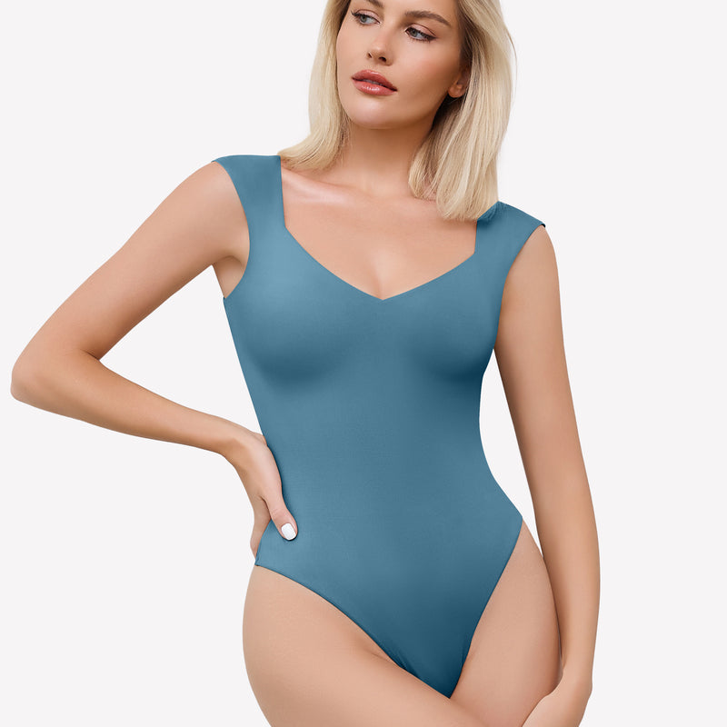 Teal seamless bodysuit with sweetheart neckline. Sexy and trendy.
