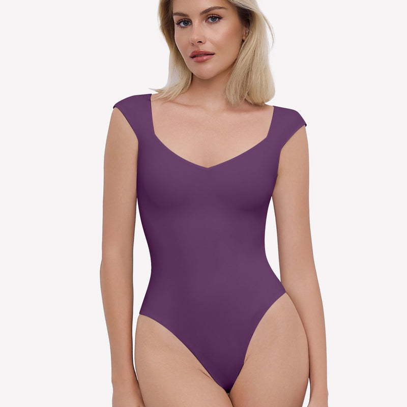 Purple seamless bodysuit with cap sleeves and sweetheart neckline. Sexy and trendy.
