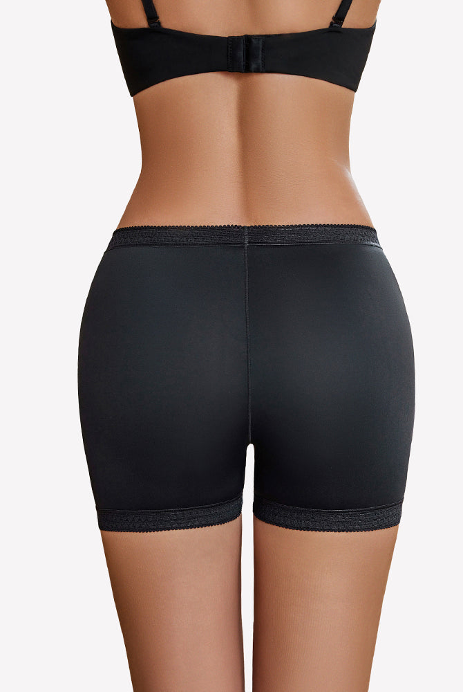 Black seamless boyshorts with lace trim, perfect for under dresses and everyday wear.