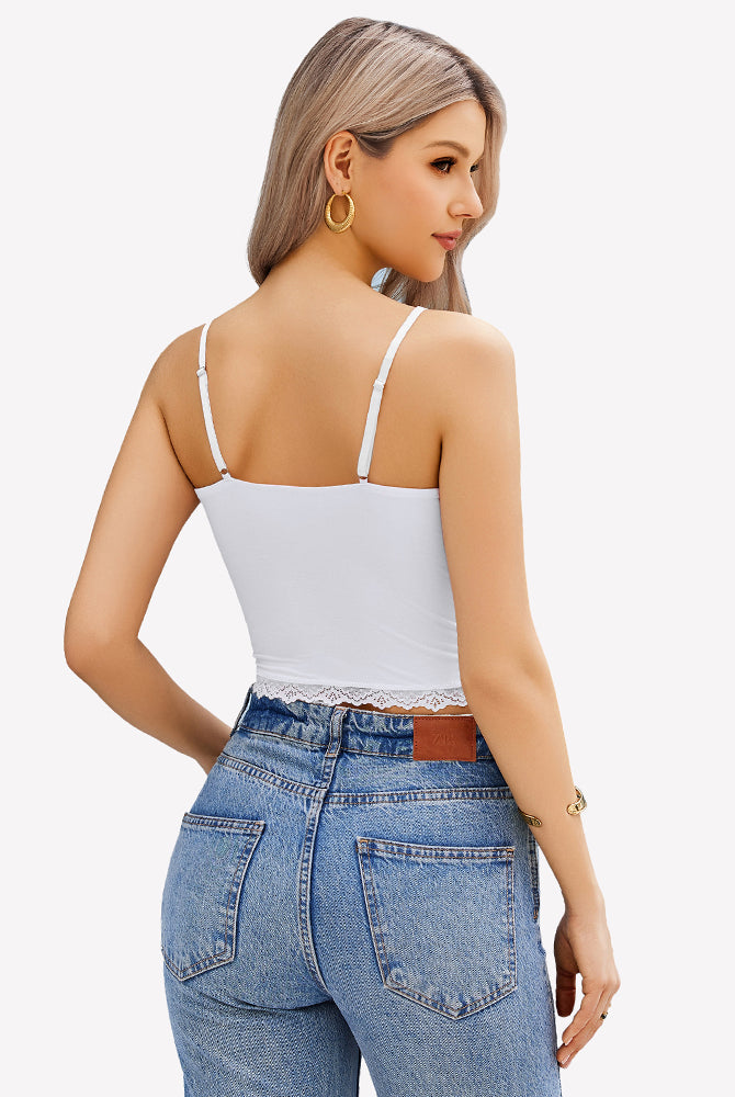 White lace cami top with adjustable straps, Y2K style, paired with blue denim jeans. Sexy camisole.