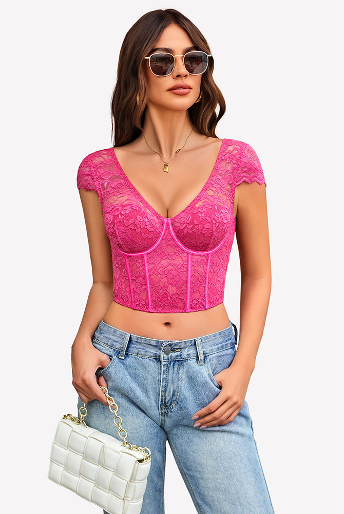 Pink floral lace bustier cap sleeve crop top with blue jeans. Sexy lingerie for women.