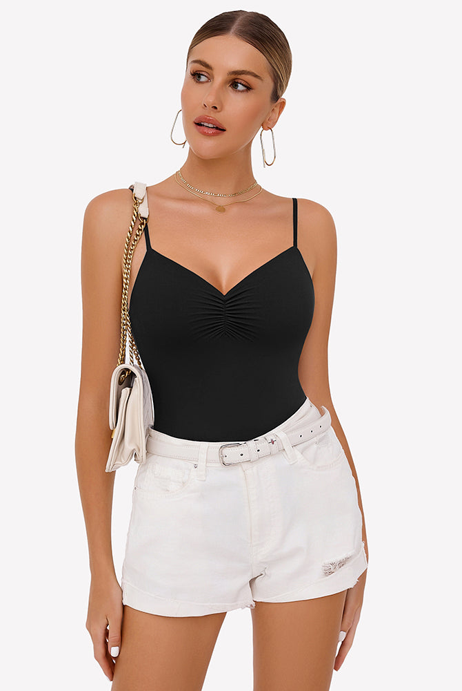 Black ruched V-neck thong bodysuit with adjustable straps. Paired with white shorts. Sexy lingerie.