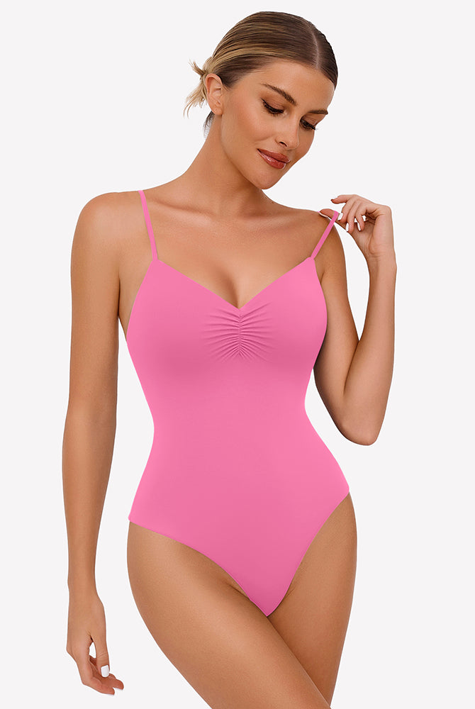 Pink ruched V-neck thong bodysuit with adjustable straps. Sexy lingerie for women.