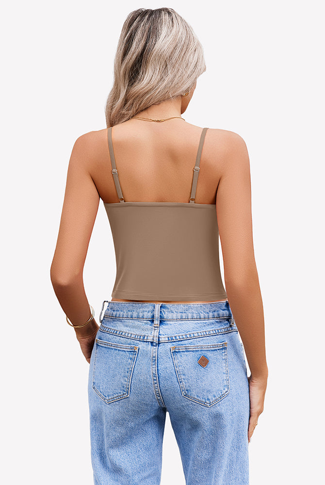 Light brown spaghetti strap crop top for women, paired with light blue jeans. Summer tank top.