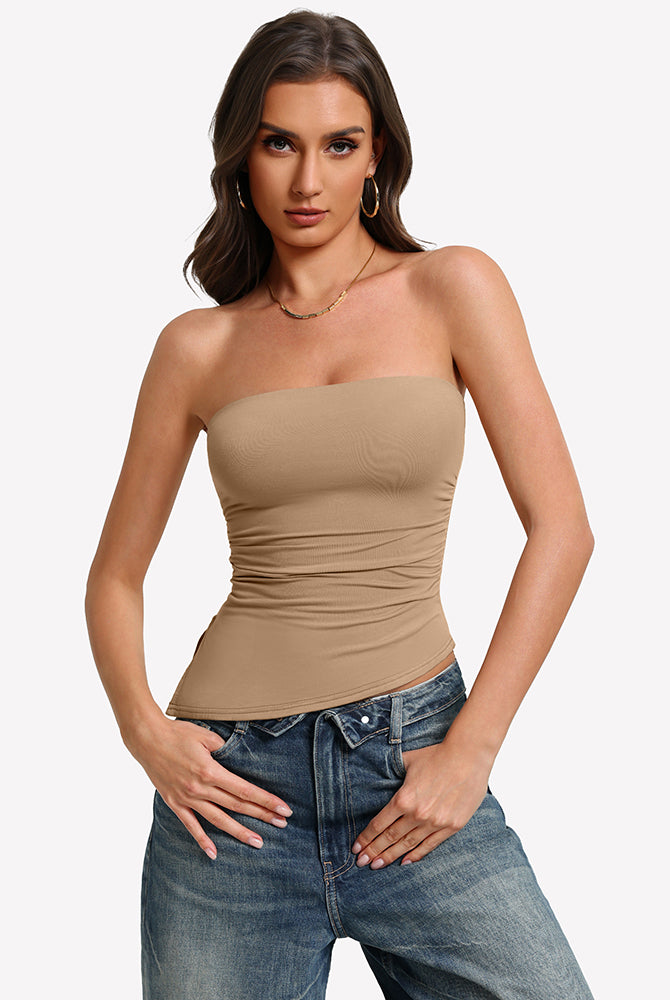 Nude strapless tube top with ruched fabric and smooth, fitted waist