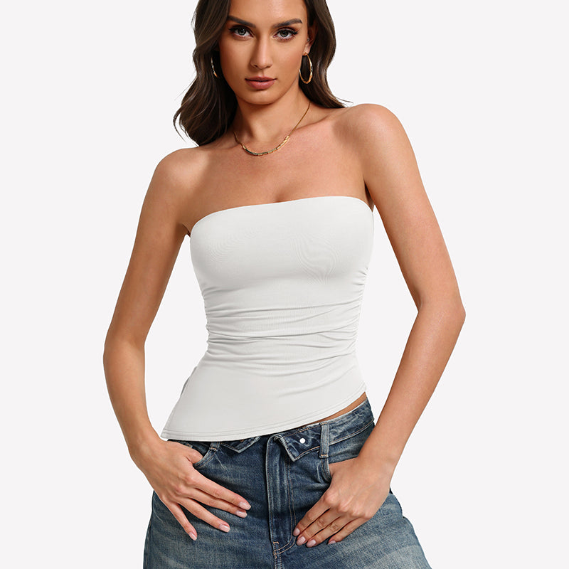 White strapless tube top with ruched fabric and smooth fitted silhouette