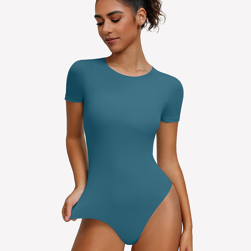 Light blue short-sleeve snap bodysuit, fitted one-piece leotard top.