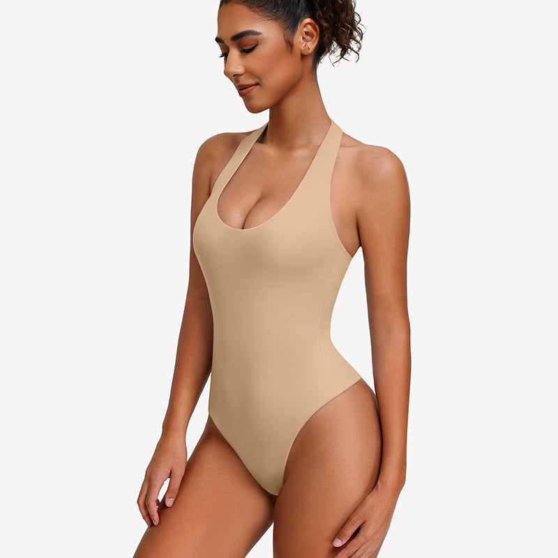 Beige halter bodysuit with deep scoop neckline, seamless one-piece