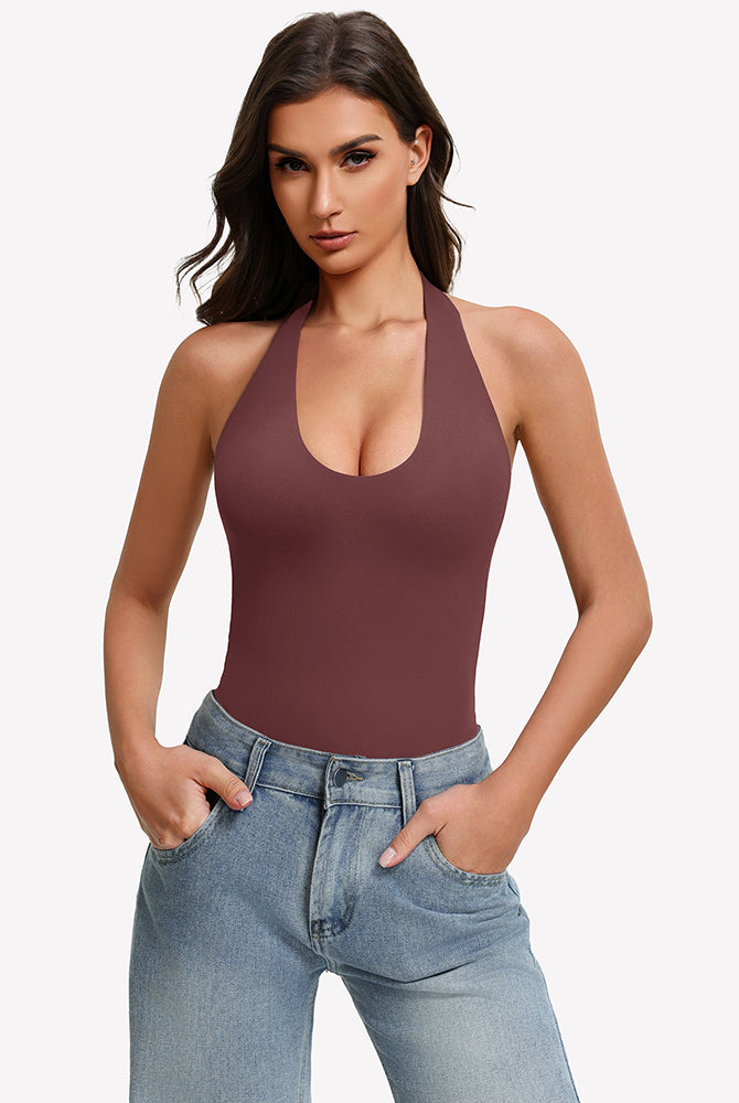 Brown halter bodysuit with deep scoop neckline, worn with blue jeans