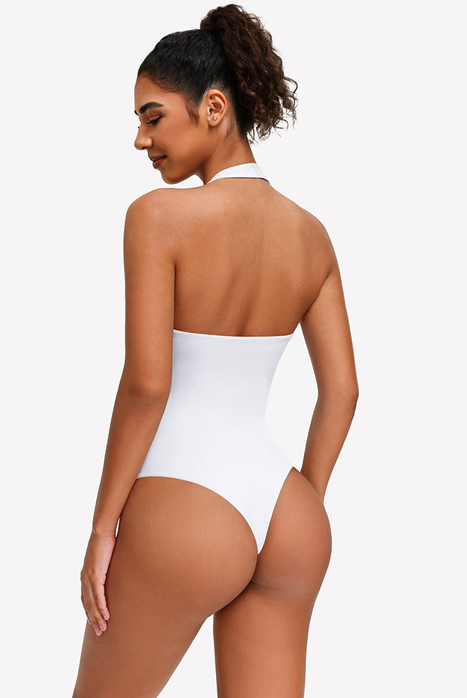 White halter bodysuit with low open back and high-cut leg coverage