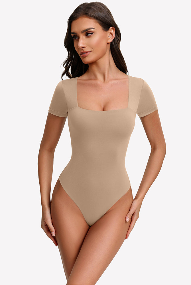 Nude short-sleeve square-neck bodysuit with fitted one-piece silhouette
