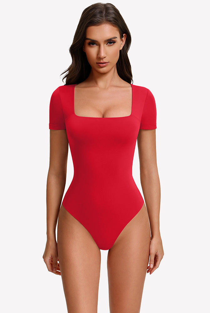 Square-neck short-sleeve bodysuit in red, fitted one-piece with high-cut legs