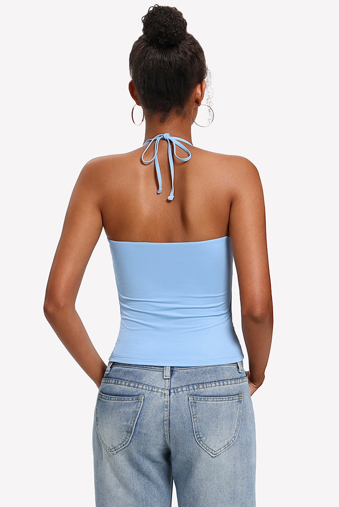 Light blue backless halter crop top with tied neck straps, double-lined camisole