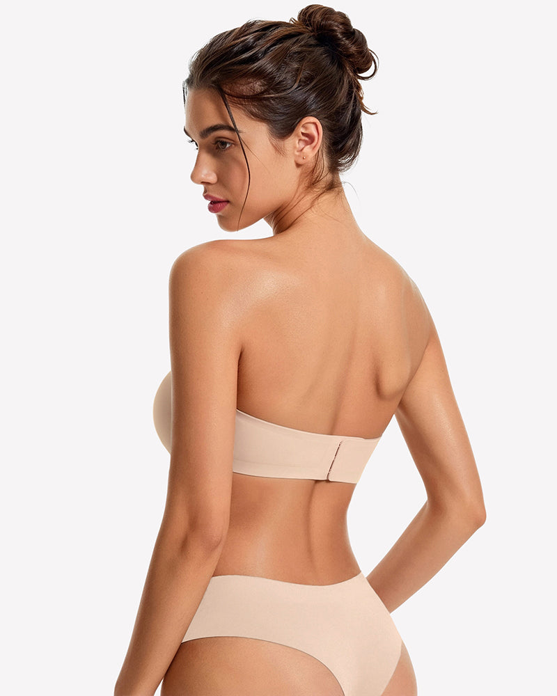 Back view of a strapless wireless bra in nude-beige with a center back seam