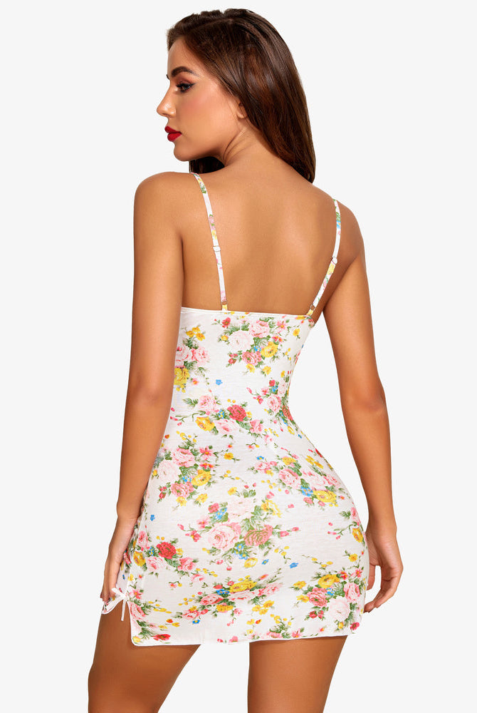Floral chemise nightgown with adjustable straps. Elegant and sensual design for comfort.